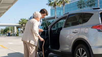 Person with a cane boarding an SUV car rental with a high driver seat in sunny Orlando