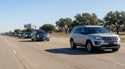 A driver's view from their car hire of a funeral procession on a sunny Texas highway