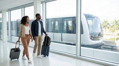 An overhead sign inside Miami Airport with directions to the MIA Mover and the car rental center