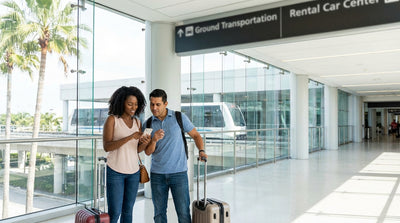 A car hire shuttle bus parked in the pickup area of the sunny Miami International Airport