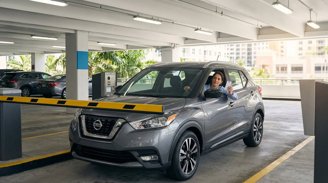 A white car hire stopped at the closed exit barrier of a modern parking garage in Miami