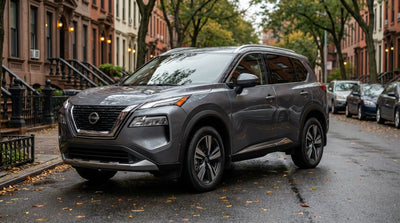 A modern car rental driving through the busy streets of New York City alongside yellow taxi cabs