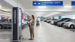 A traveler locates their car rental in a numbered bay at the SFO airport garage in San Francisco