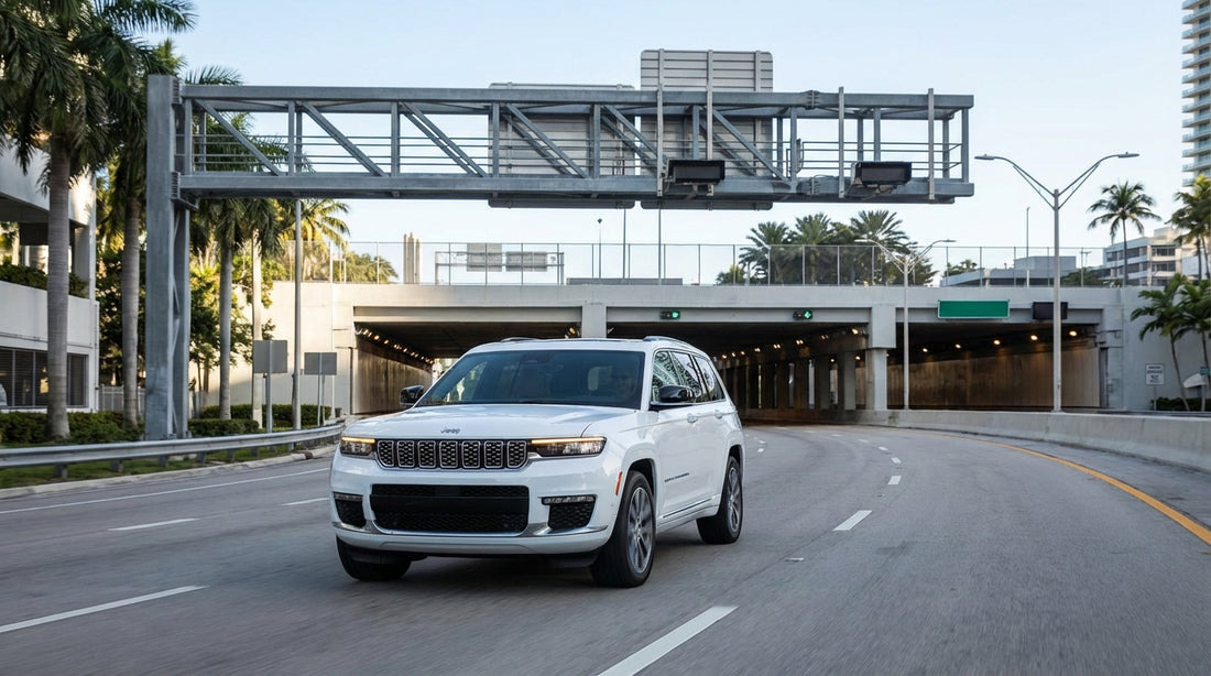 A car hire vehicle driving towards the entrance of the PortMiami Tunnel under a sunny blue sky in Miami