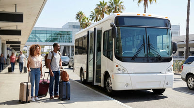 A green LAX-it shuttle bus waits for passengers needing car rental pickup at Los Angeles airport