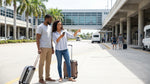 A car hire shuttle bus waiting for passengers outside the ground transportation area at Orlando Airport's Terminal B