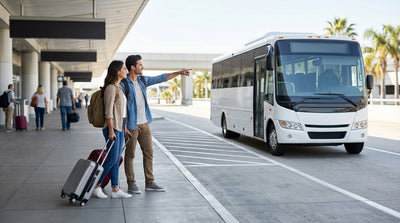 A row of car hire shuttle buses waiting for travelers outside the Orlando Airport terminal