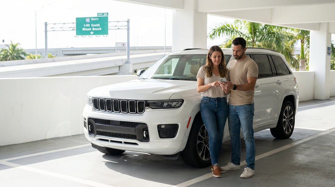 View from inside a car hire driving over a sunny causeway towards the downtown Miami skyline