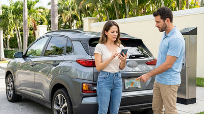 A driver standing by a modern car rental on a sunny Miami street, looking at a parking meter sign