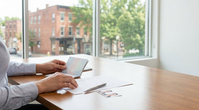 A driver's view from a car rental on a scenic road trip through the rolling green hills of Pennsylvania