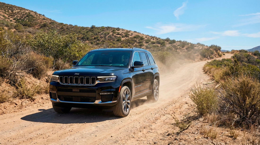 Black Jeep SUV driving on a dusty unpaved road, highlighting off-road restrictions for standard car rentals.